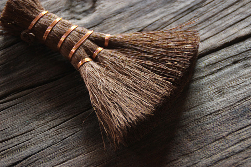 Hand-woven brown hair broom