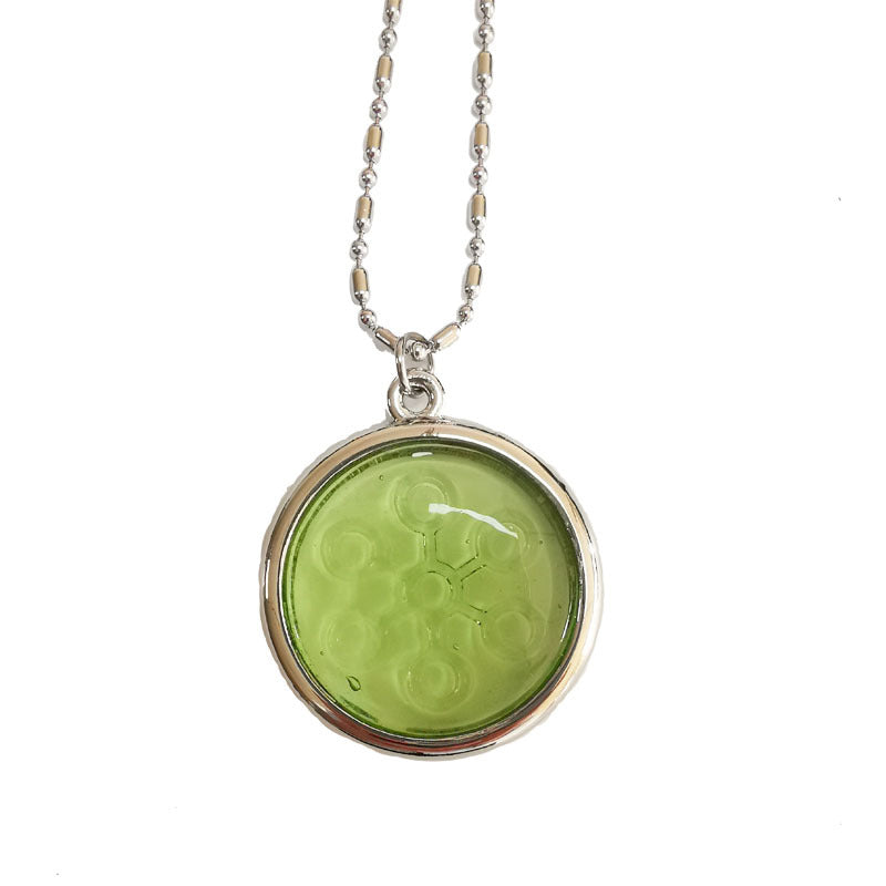 Green glass energy pendant